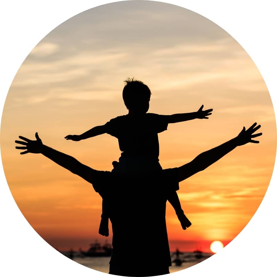 Father and child enjoying a sunset moment for Father’s Day spa gift inspiration