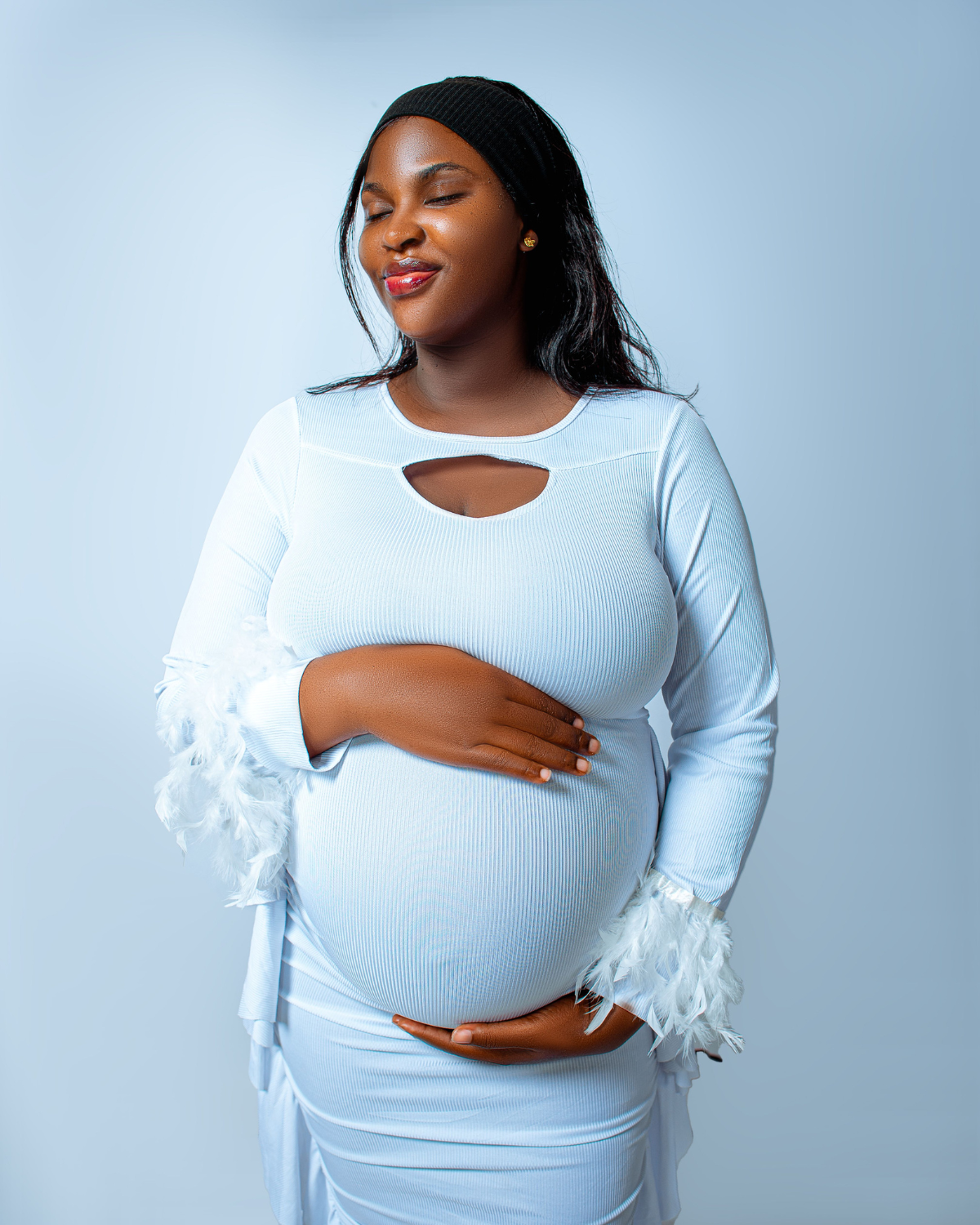 Pregnant guest preparing for a professional Pregnancy Massage in San Diego