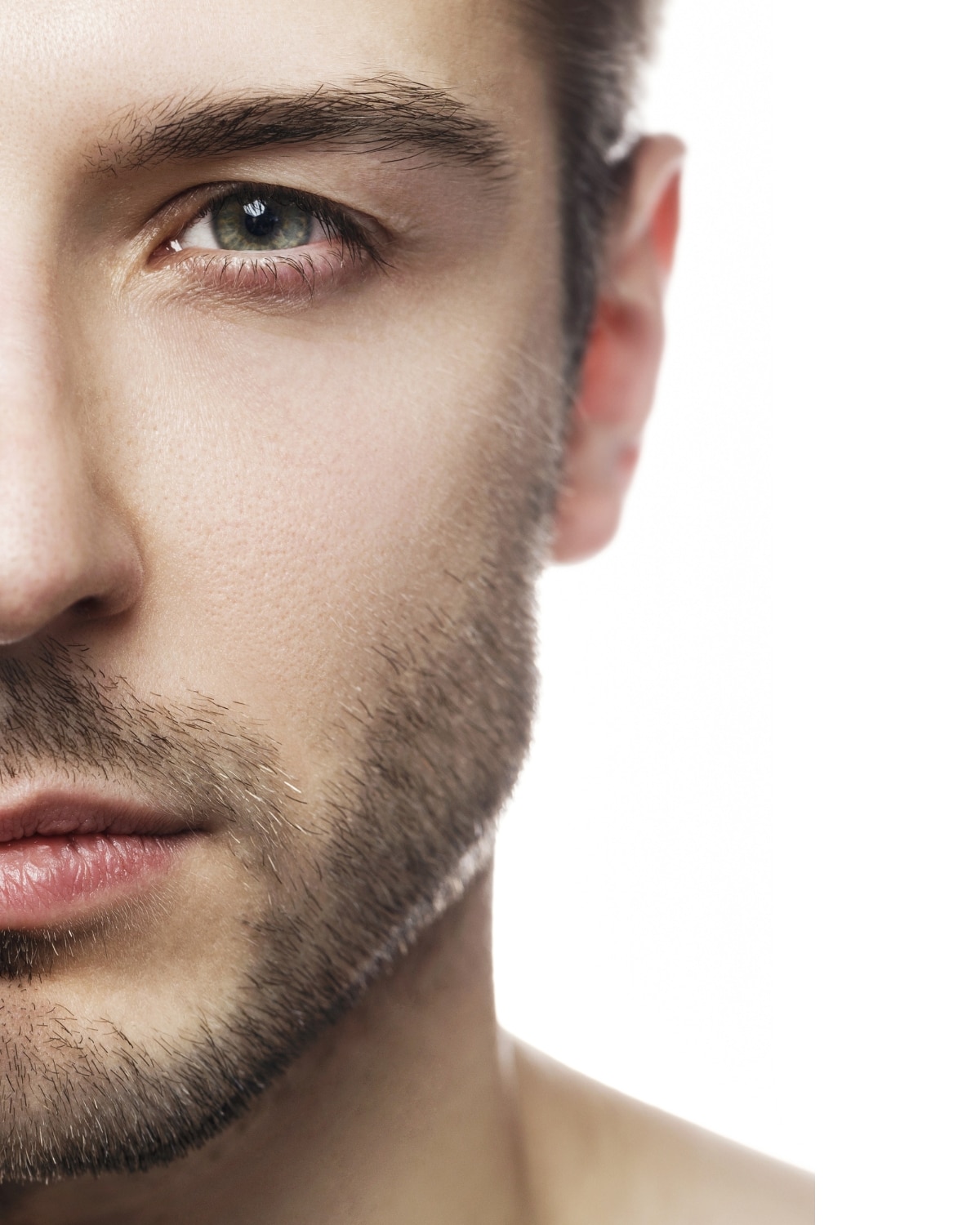Relaxed man with healthy-looking skin representing the Men's Urban Facial at The Knotstop in San Diego